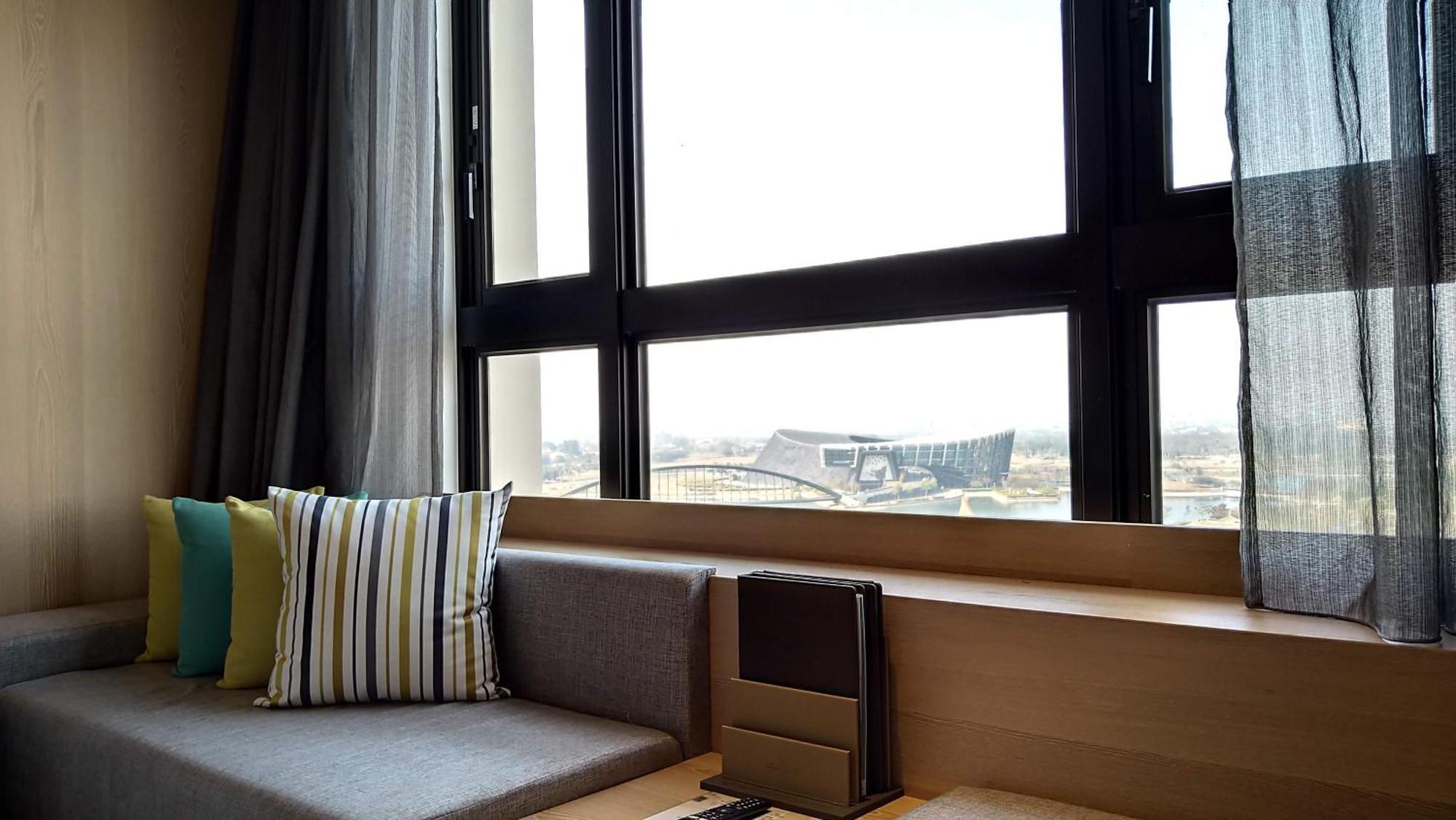 Evergreen Palace Hotel Chiayi Taibao Экстерьер фото A window seat